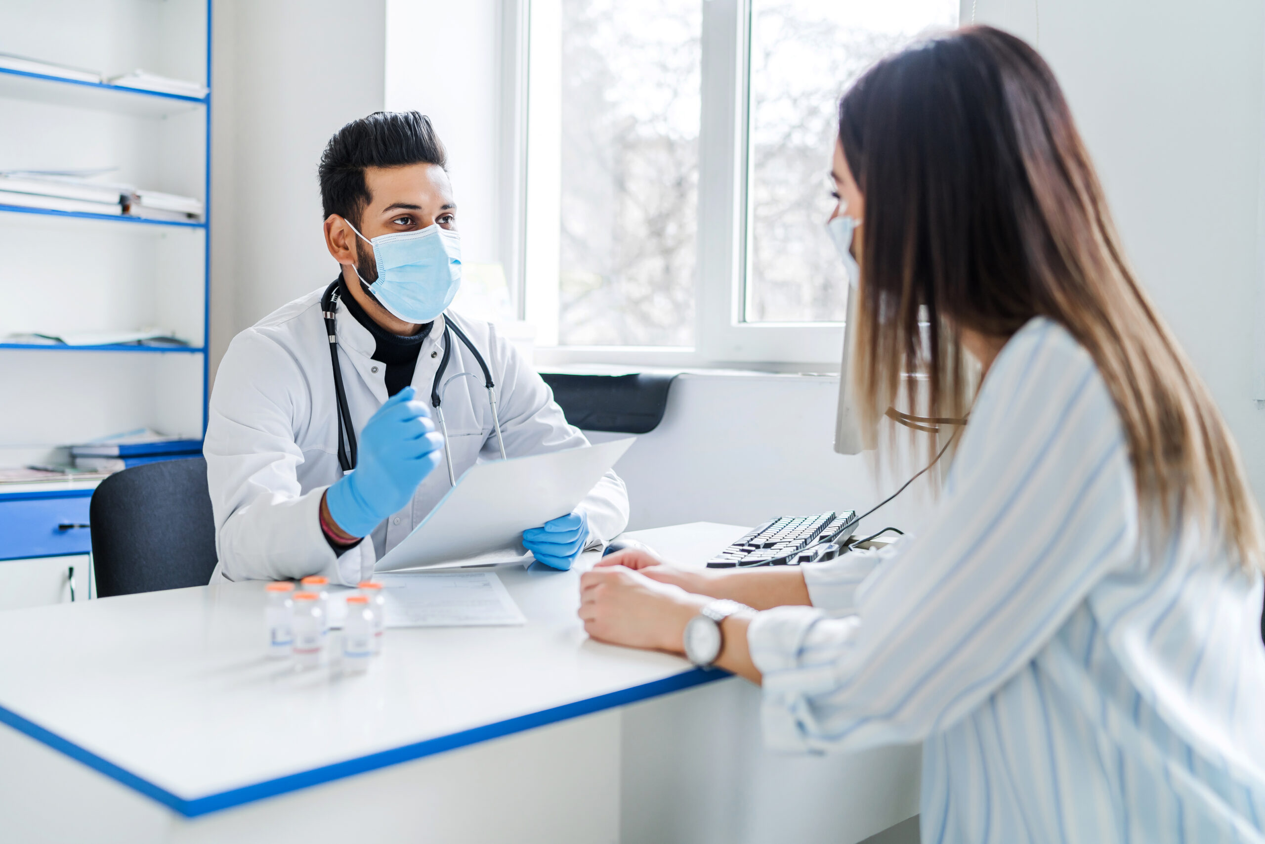 the indian doctor receives the patient and tells him about the results of the tests medicine health scaled